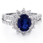 2.57 Cts Oval Cut Blue Gemstone with Round Brilliant Cut Diamonds Engagement Ring Set in 18K White Gold